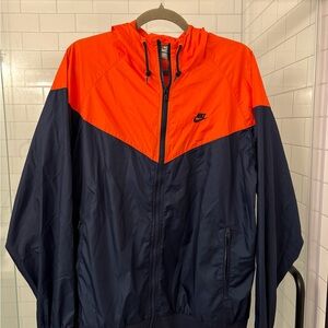 Nike Orange and Blue Windbreaker with Chevron Design